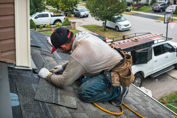 Professional Roofing technician working in Machesney Park, IL